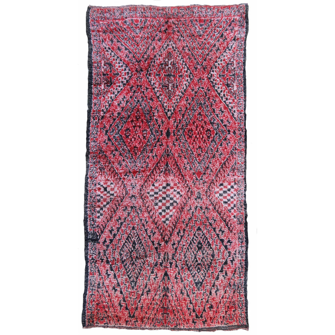 Beni MGuild rugs are typical tribal carpets with graphic motifs. Each piece is unique with motifs passed from mother to daughter over generations. Stock No. 15684.
You will love this beautiful large Oriental Moroccan room size area rug. The plush pile makes you walk like on clouds. It will be a great decorating object in a living room, dining room, bedroom, kids room, office or entry. No wonder that interior designers love these vintage Moroccan tribal Beni MGuild rugs.