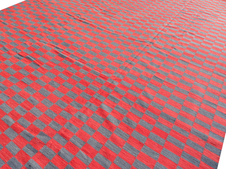 This outstanding room size Kilim rug with MAZANDARAN style has a minimalistic design and finds it´s roots in Art Deco. It goes great with reduced and modern styles, brutalist or south western interior design. 15 x 12 ft is a great size for a dining room, living room or a bedroom. For a Kilim item, it is a oversized carpet. Bring the RED CARPET to your home. 16249