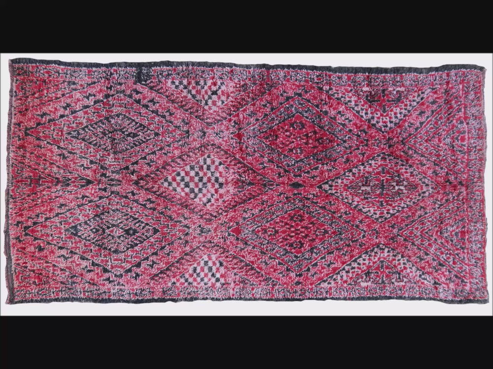 Beni MGuild rugs are typical tribal carpets with graphic motifs. Each piece is unique with motifs passed from mother to daughter over generations. Stock No. 15684.
You will love this beautiful large Oriental Moroccan room size area rug. The plush pile makes you walk like on clouds. It will be a great decorating object in a living room, dining room, bedroom, kids room, office or entry. No wonder that interior designers love these vintage Moroccan tribal Beni MGuild rugs.