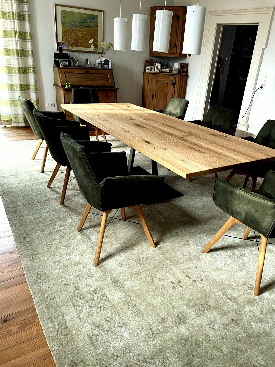 Custom made silk rug under a dining room table