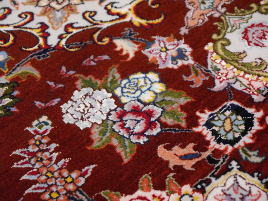 Tabriz rug floral detail on deep red field – 12250