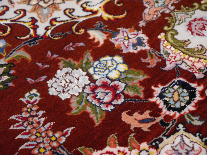 Tabriz rug floral detail on deep red field – 12250