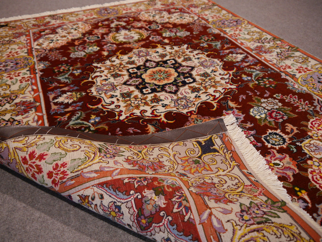 Tabriz rug medallion, angled pile view – 12250