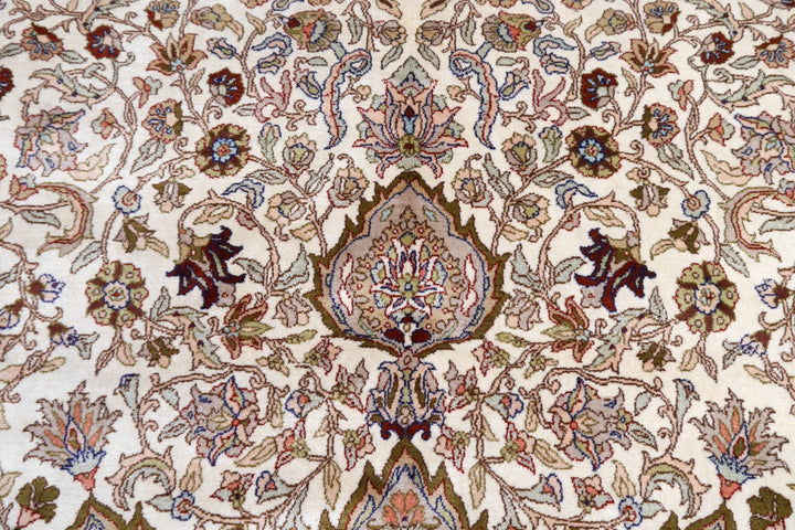 Hereke palace rug — floral spandrel detail