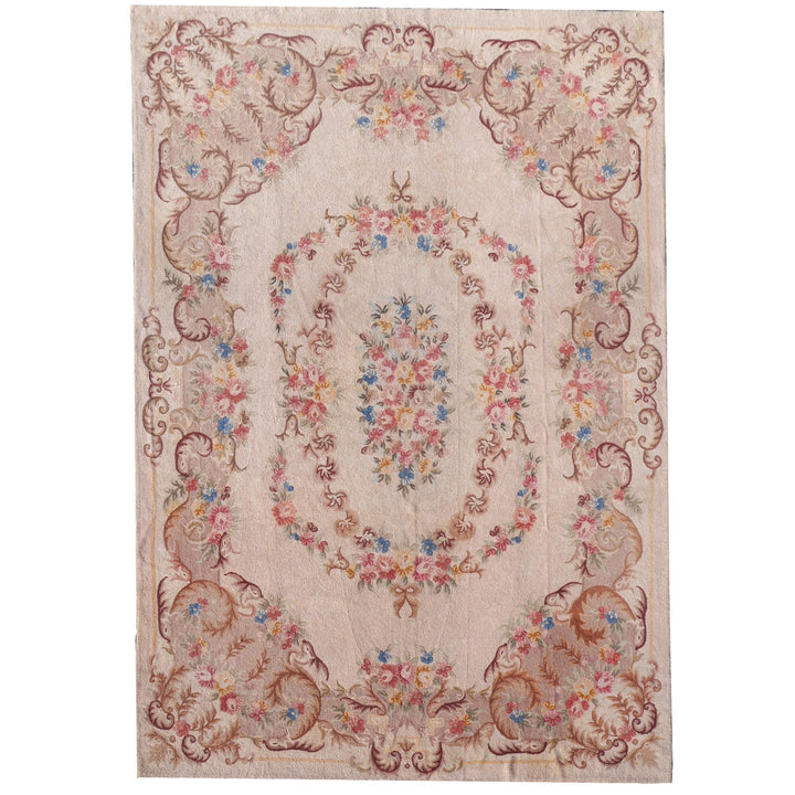 Antique Arraiolos needlepoint rug from Portugal in the French Aubusson style, hand-embroidered pure wool on linen, 450 × 325 cm, floral medallion in beige, light blue and rose | Djoharian 14717