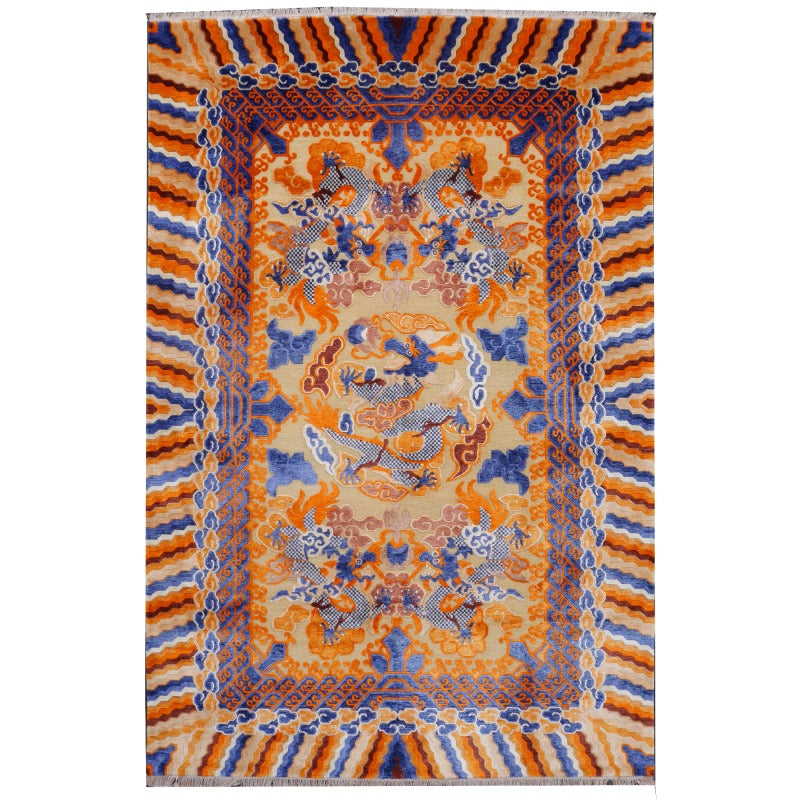 Dragon Rug Imperial Silk China hand-knotted beige orange blue. Rectangular, colorful silk rug in the style of Imperial China, featuring a central dragon motif in orange, blue, and beige, surrounded by intricate, symmetrical patterns and borders with traditional Chinese ornaments
