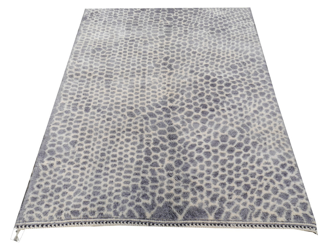 Zarah leopard rug — corner and fringe detail