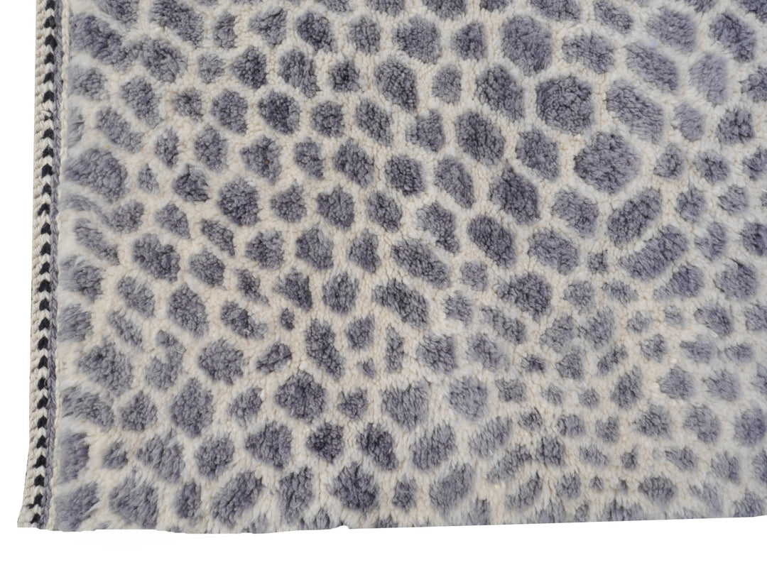 Zarah leopard rug — selvedge edge