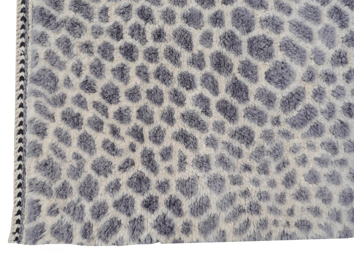 Zarah leopard rug — selvedge edge
