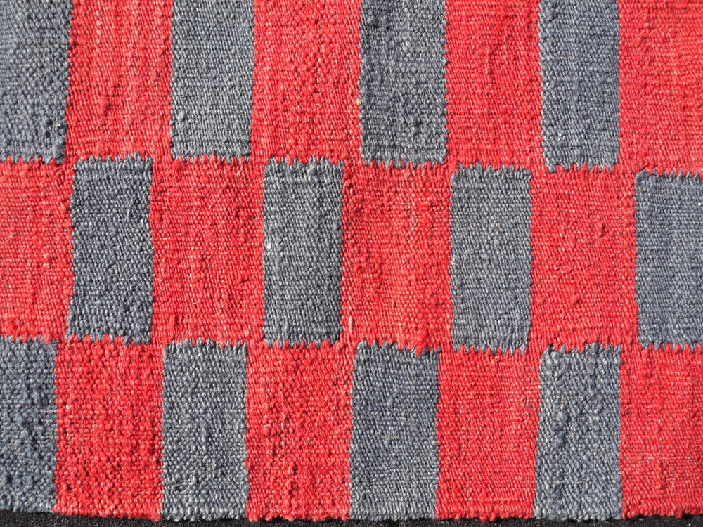 This outstanding room size Kilim rug with MAZANDARAN style has a minimalistic design and finds it´s roots in Art Deco. It goes great with reduced and modern styles, brutalist or south western interior design. 15 x 12 ft is a great size for a dining room, living room or a bedroom. For a Kilim item, it is a oversized carpet. Bring the RED CARPET to your home. 16249
