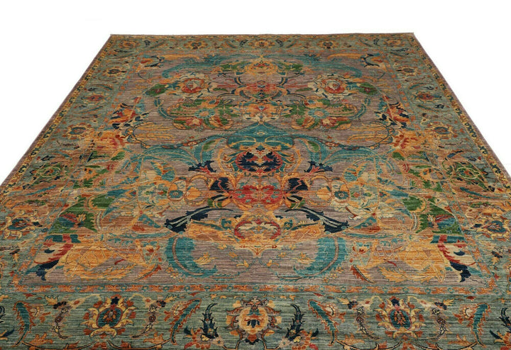 This beautiful rug originated in rural Afghanistan, where it was hand-knotted by tribal weavers. The pile material is handspun wool that has been dyed with vegetable and mineral pigments. The motifs are made of silver-colored bamboo silk. It is of excellent quality with a subtle sheen and elegant organic colors. The design comes from ancient Persia. The style of this rug is known as a polonaise pattern and is typical of antique rugs from the Safavid Dynasty in the late 16th century. 