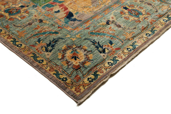 This beautiful rug originated in rural Afghanistan, where it was hand-knotted by tribal weavers. The pile material is handspun wool that has been dyed with vegetable and mineral pigments. The motifs are made of silver-colored bamboo silk. It is of excellent quality with a subtle sheen and elegant organic colors. The design comes from ancient Persia. The style of this rug is known as a polonaise pattern and is typical of antique rugs from the Safavid Dynasty in the late 16th century. 
