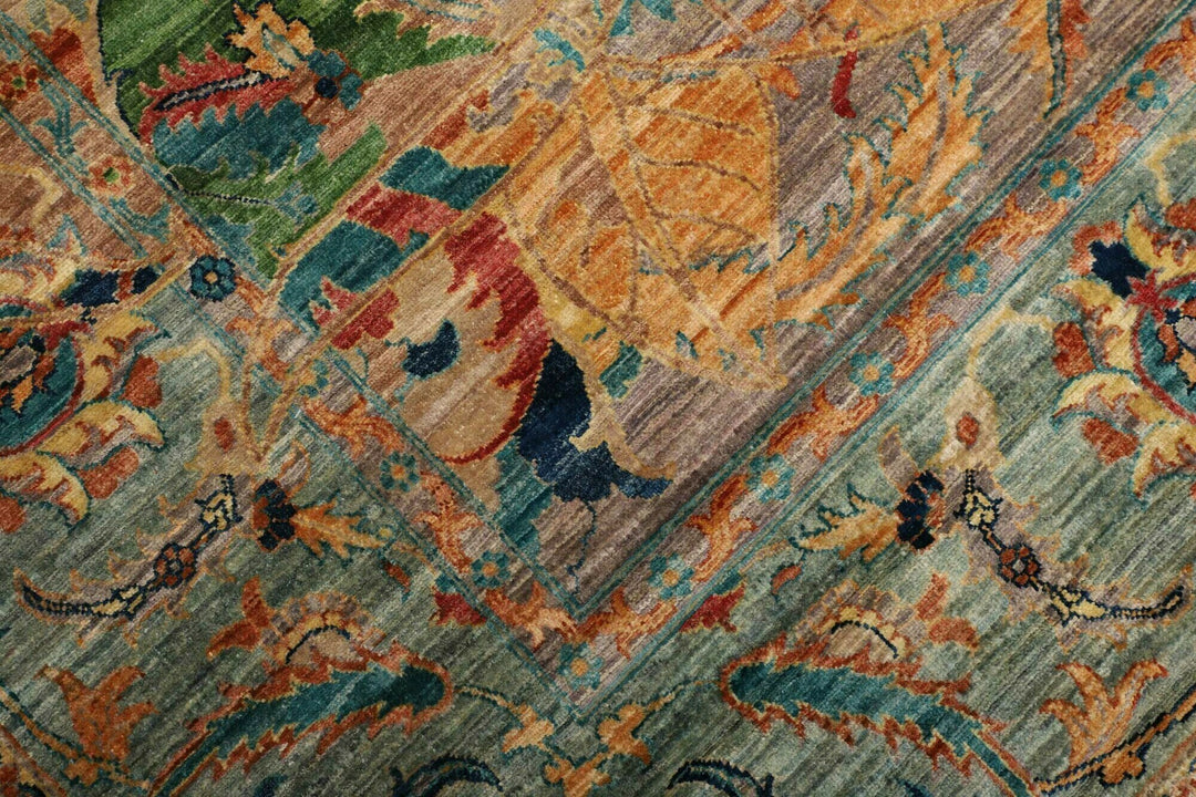This beautiful rug originated in rural Afghanistan, where it was hand-knotted by tribal weavers. The pile material is handspun wool that has been dyed with vegetable and mineral pigments. The motifs are made of silver-colored bamboo silk. It is of excellent quality with a subtle sheen and elegant organic colors. The design comes from ancient Persia. The style of this rug is known as a polonaise pattern and is typical of antique rugs from the Safavid Dynasty in the late 16th century. 