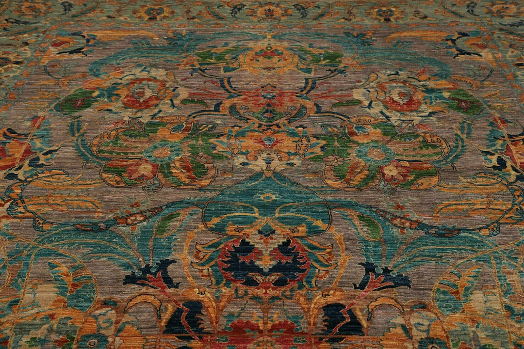 This beautiful rug originated in rural Afghanistan, where it was hand-knotted by tribal weavers. The pile material is handspun wool that has been dyed with vegetable and mineral pigments. The motifs are made of silver-colored bamboo silk. It is of excellent quality with a subtle sheen and elegant organic colors. The design comes from ancient Persia. The style of this rug is known as a polonaise pattern and is typical of antique rugs from the Safavid Dynasty in the late 16th century. 