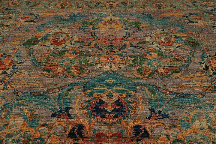This beautiful rug originated in rural Afghanistan, where it was hand-knotted by tribal weavers. The pile material is handspun wool that has been dyed with vegetable and mineral pigments. The motifs are made of silver-colored bamboo silk. It is of excellent quality with a subtle sheen and elegant organic colors. The design comes from ancient Persia. The style of this rug is known as a polonaise pattern and is typical of antique rugs from the Safavid Dynasty in the late 16th century. 