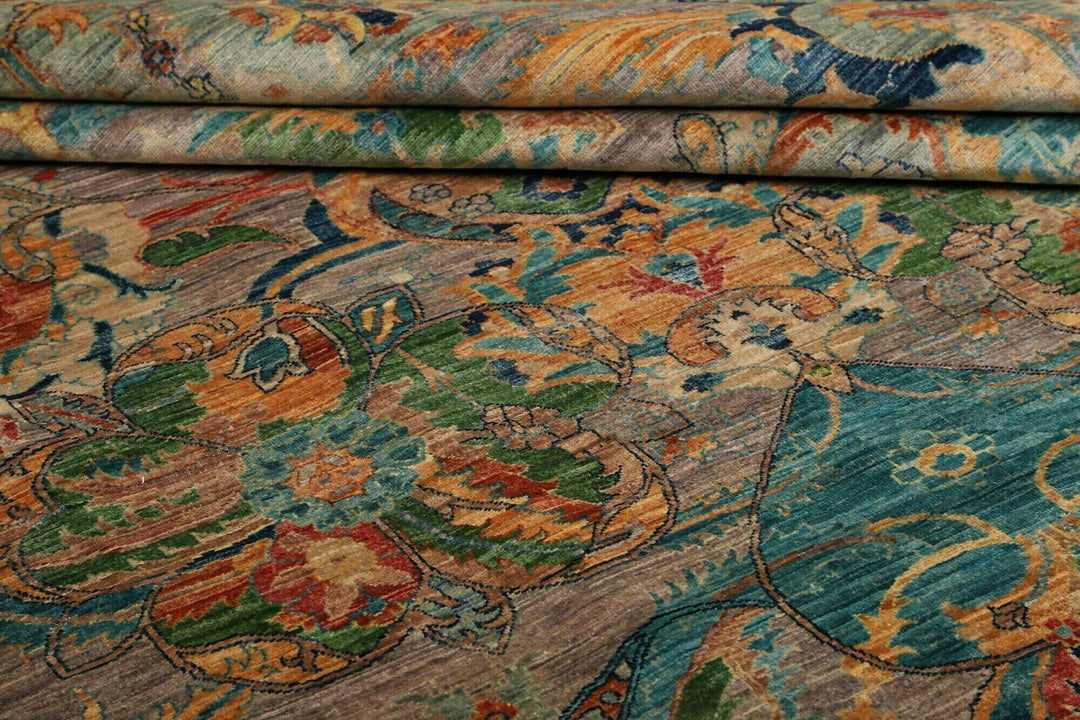 This beautiful rug originated in rural Afghanistan, where it was hand-knotted by tribal weavers. The pile material is handspun wool that has been dyed with vegetable and mineral pigments. The motifs are made of silver-colored bamboo silk. It is of excellent quality with a subtle sheen and elegant organic colors. The design comes from ancient Persia. The style of this rug is known as a polonaise pattern and is typical of antique rugs from the Safavid Dynasty in the late 16th century. 