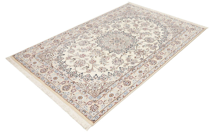 This fine, Persian rug is a typical piece in the popular traditional Nain design. The colors are a wool white field, beige border and light blue accents. The size is 203 x 132 cm, the quality is 9la. The round Medaillon is floral like the field and corners.