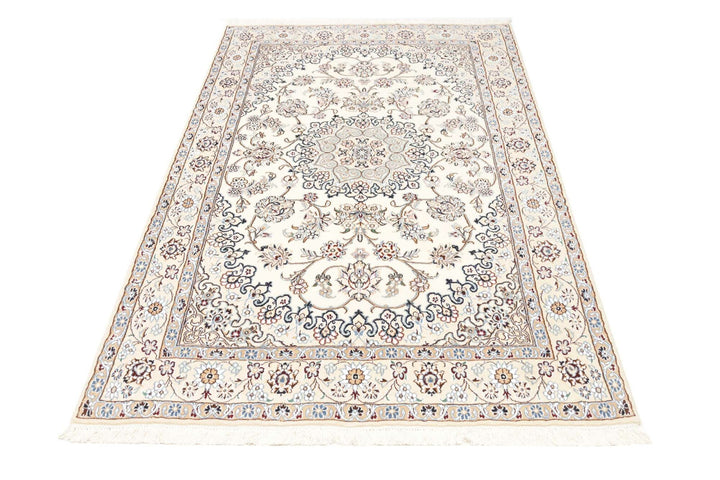 This fine, Persian rug is a typical piece in the popular traditional Nain design. The colors are a wool white field, beige border and light blue accents. The size is 203 x 132 cm, the quality is 9la. The round Medaillon is floral like the field and corners.