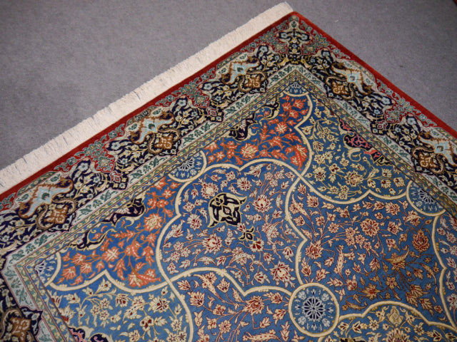 Qum silk rug detail — central floral medallion, Djoharian #12233