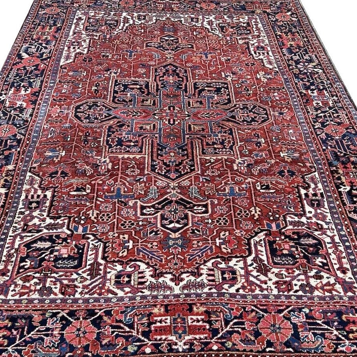 Antique Heriz Serapi rug, 8 x 12 ft, indigo and brown Persian carpet for a grand living room or dining area, circa 1940